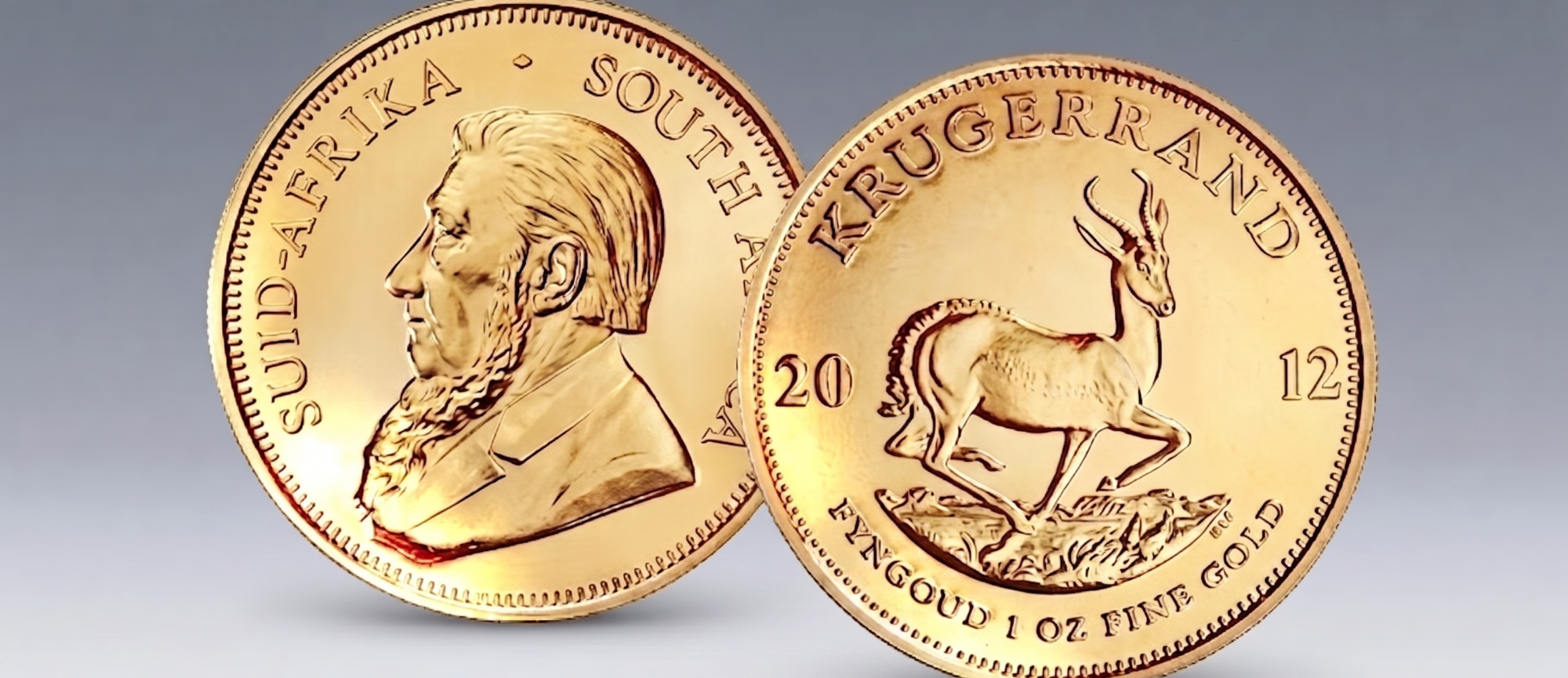 Krugerrand-Goldmünzen: Das ikonische südafrikanische Duo Glänzende Krugerrand-Goldmünzen: Paul Kruger (links) und Springbock (rechts).